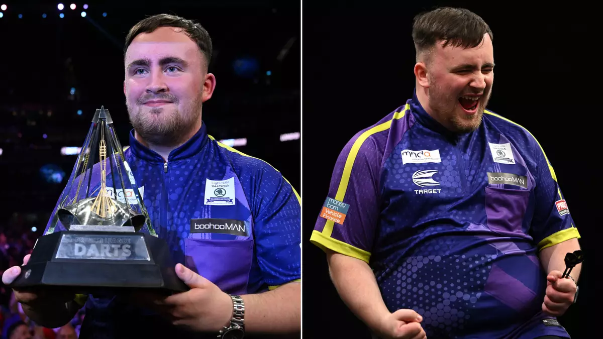 Luke Littler celebrating a darts championship victory with a trophy.