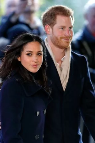 Harry and Meghan fight amid royal tensions captured in a dramatic photograph.